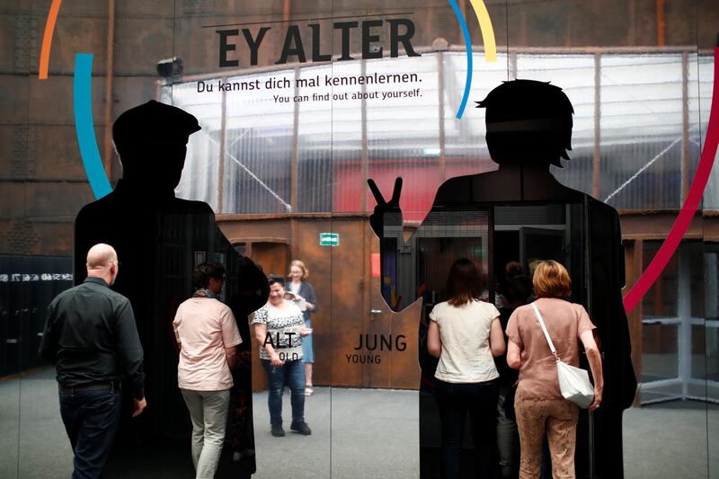 People visit an exhibition about demografic change called 'Ey Alter' by carmaker Mercedes Benz in Berlin, Germany June 5, 2018. Picture taken June 5, 2018. REUTERS/Axel Schmidt