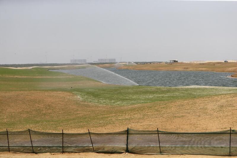A man-made lake, part of the 18-hole Jack Nicklaus-designed golf course. Sarah Dea / The National
