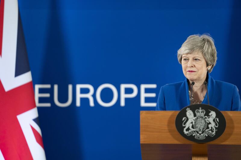 Theresa May, U.K. prime minister, pauses during a news conference following a European Union leaders summit in the Europa building in Brussels, Belgium, Thursday, April 11, 2019. Brexit is on course to be delayed until the end of October under a plan to avoid a chaotic no-deal split, risking six more months of political uncertainty over Britain's ties to the European Union. Photographer: Jasper Juinen/Bloomberg