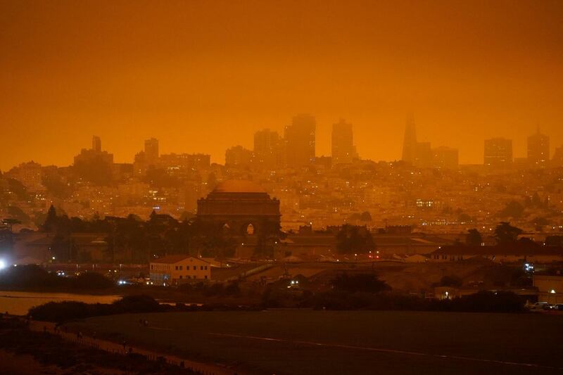 The skyline in the distance behind Crissy Field is barely visible with smoke from wildfires, in San Francisco. AP Photo