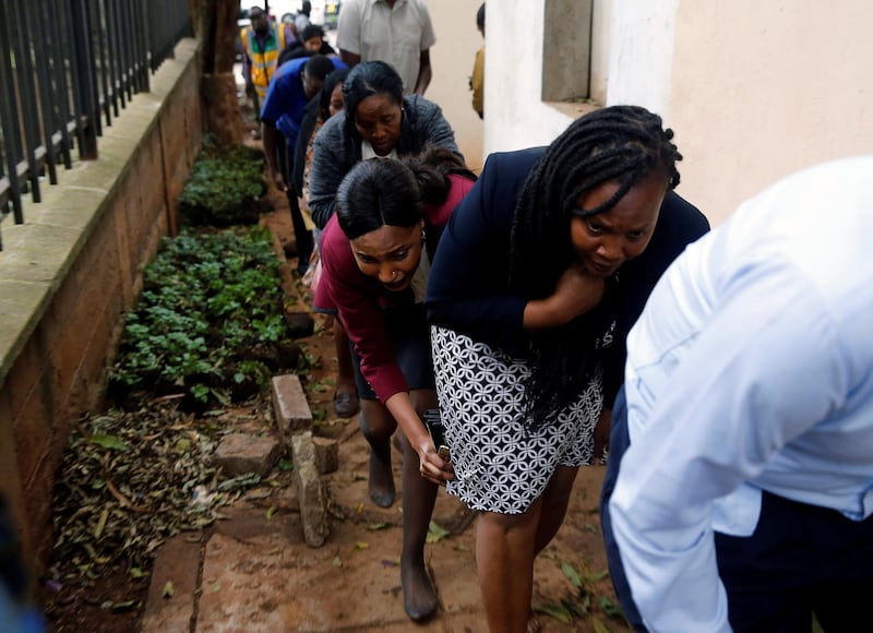 People are evacuated from the danger zone. Thomas Mukoya / Reuters