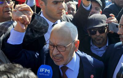 Leader of the Ennahdha party Rached Ghannouchi arrives at a police station I Tunis, Tuesday, Feb. 21, 2023. AP