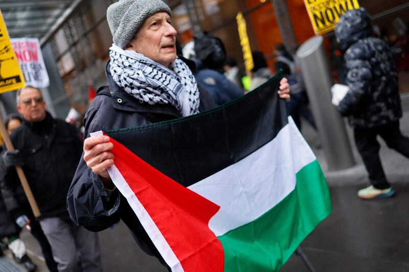Pro-Palestinian protestors gathering outside of the New York Times building to protest the newspaper’s coverage of the Israel-Hamas war in New York City. Getty