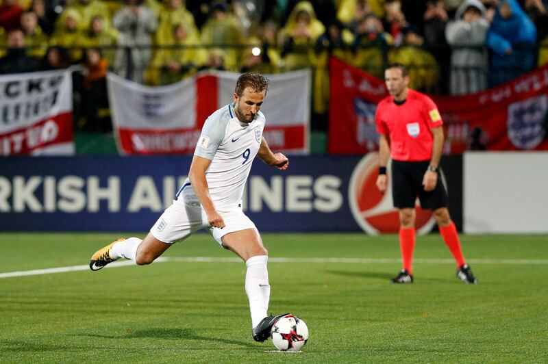 England's Harry Kane scoring his goal from penalty during their World Cup Group F qualifying soccer match between Lithuania and England at the LFF stadium in Vilnius, Lithuania, Sunday, Oct. 8, 2017. (AP Photo/Mindaugas Kulbis)