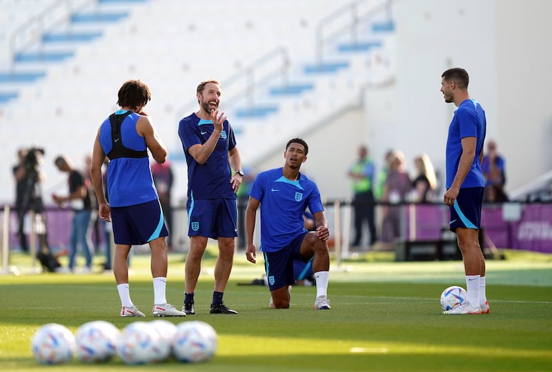 England manager Gareth Southgate speaks to the players. PA