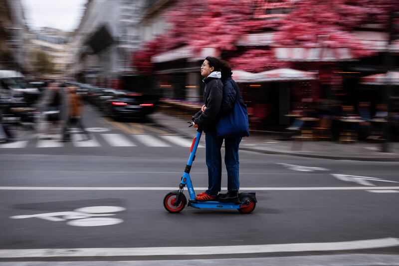 About 100,000 journeys are completed each day in France on rented e-scooters in 200 towns and cities. EPA