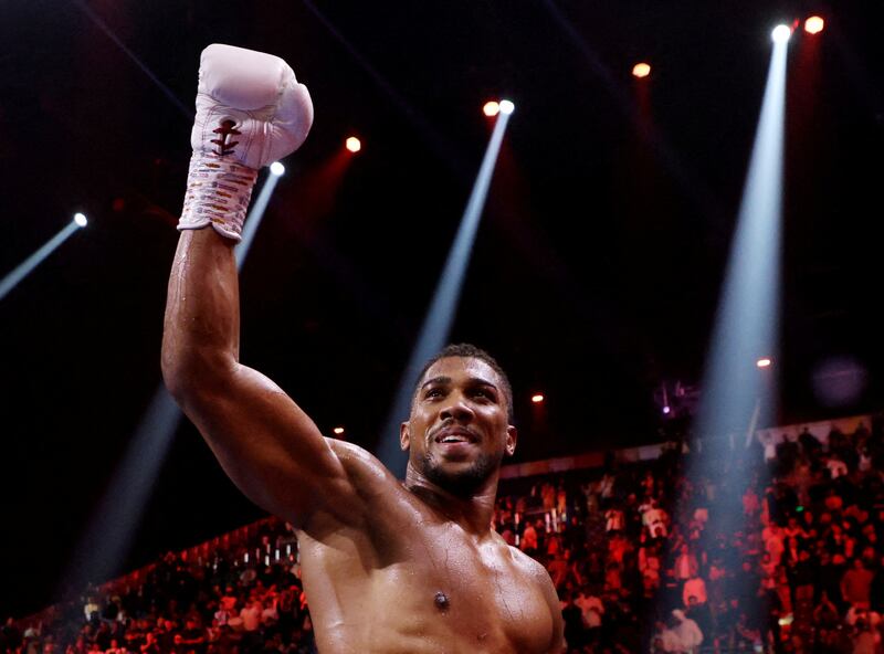Anthony Joshua celebrates after winning his fight against Otto Wallin. Reuters