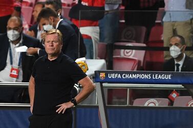 Barcelona's Dutch coach Ronald Koeman reacts after the UEFA Champions League first round group E footbal match between Benfica and Barcelona at the Luz stadium in Lisbon on September 29, 2021.  (Photo by PATRICIA DE MELO MOREIRA  /  AFP)