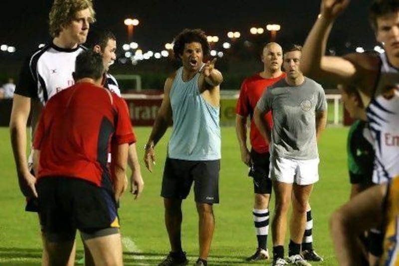 Colin Charvis, centre, held two training sessions with the Dubai Hurricanes.