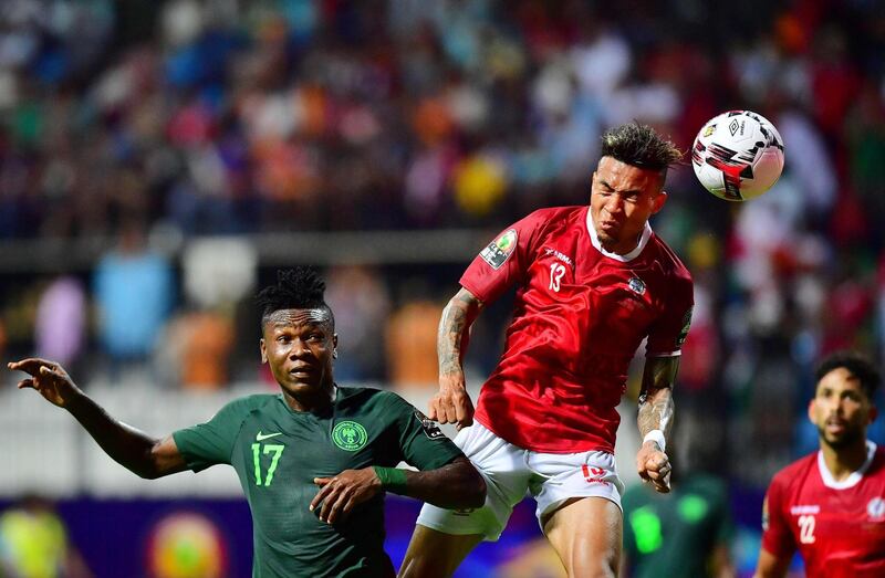 Nigeria forward Samuel Kalu, left, vies for the ball with Madagascar midfielder Anicet Andrianantenaina. AFP