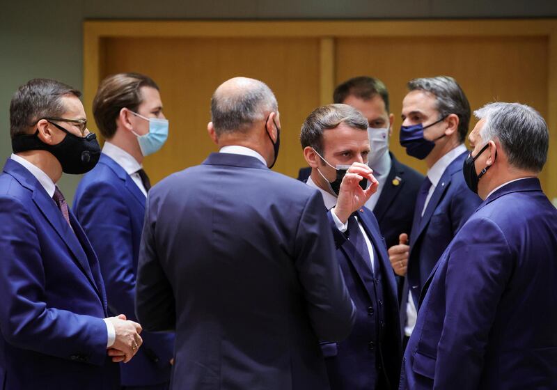 Macron speaks with Hungary's Prime Minister Viktor Orban, Poland's Prime Minister Mateusz Morawiecki, Austria's Chancellor Sebastian Kurz and Greece's Prime Minister Kyriakos Mitsotakis in Brussels, Belgium, on December 10. Reuters