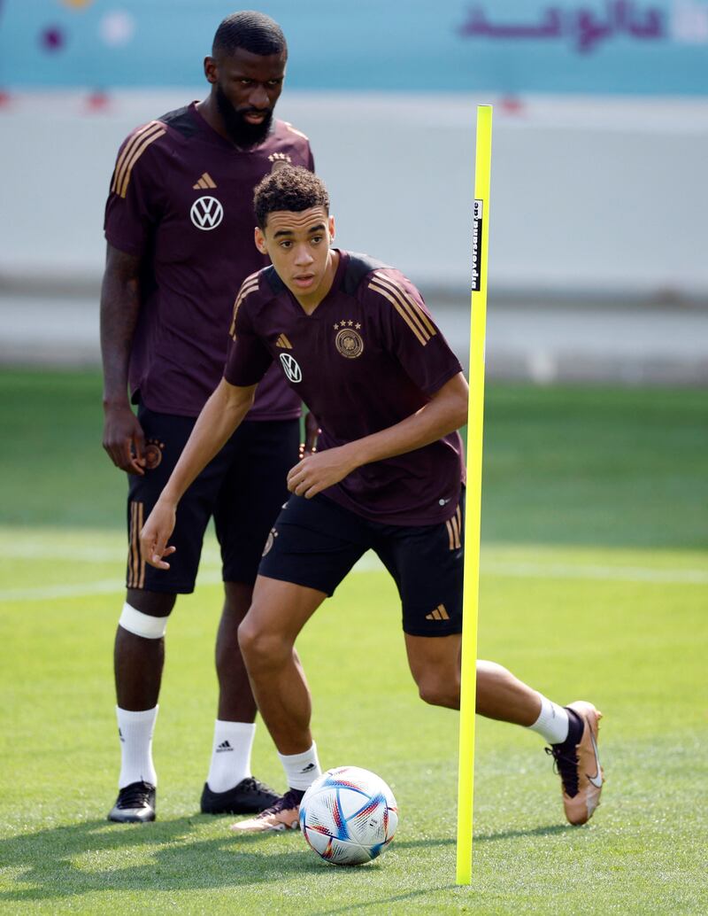 Germany's Jamal Musiala and Antonio Rudiger during training. Reuters