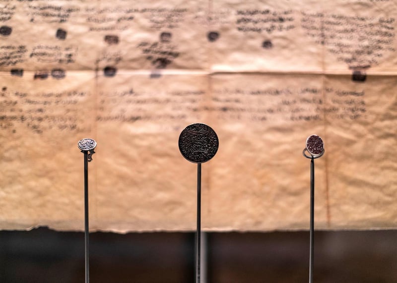 RIYADH, KINGDOM OF SAUDI ARABIA. 26 SEPTEMBER 2019. 
Coins exhibited in At-Turaif district museum in Ad-Dariya.

At-Turaif was founded in the 15th century, with much influence owed to the Najdi architectural style of Arabia. In the mid-18th century, the sprawling mud-brick city spawned the dynasty of Al Saud, who had lived in Ad Diriyah since the 15th century. 

The largest single structure in the city is Salwa Palace, which extends over approximately 10,000 square metres and consists of seven main units. The palace contains the Ad Diriyah museum, with more museums set to come.
Former villa residences that once housed families in 18th-and 19th-century At-Turaif have been converted into a souq, plus an array of cubby­hole areas where demonstrations of traditional crafts now take place – calligraphy, medicine, carpet weaving and the making of weapons are among the attractions. Again, all the staff are Saudis.

(Photo: Reem Mohammed/The National)

Reporter:
Section: