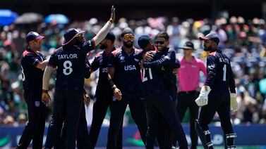 United States' Nitish Kumar, third right, celebrates with teammates after taking the catch to dismiss Pakistan's Iftikhar Ahmed in super over during the ICC Men's T20 World Cup cricket match between United States and Pakistan at the Grand Prairie Stadium in Grand Prairie, Texas, Thursday, June 6, 2024.  (AP Photo / Tony Gutierrez)