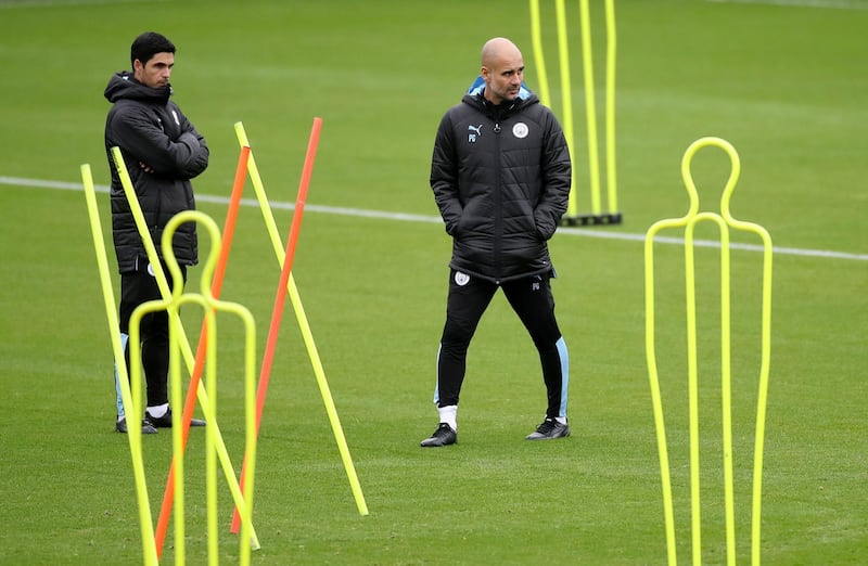 Manchester City manager Pep Guardiola, right with his assistant manager Mikel Arteta. Reuters