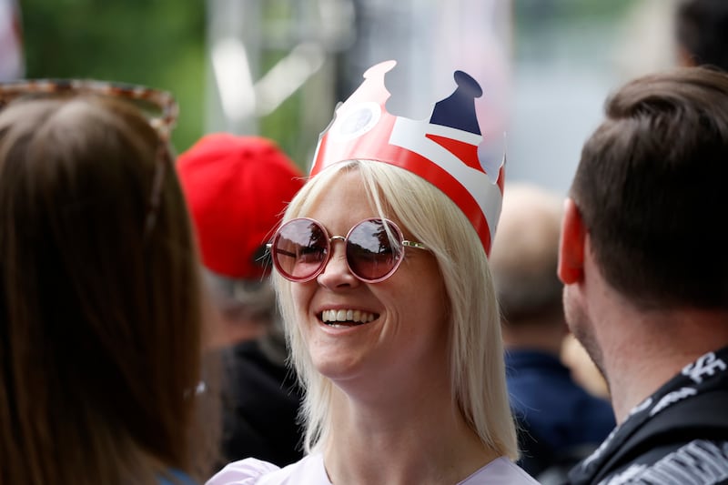 Royal fans gather on The Mall outside Buckingham Palace. AP Photo 