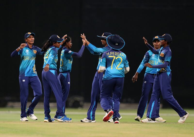 Sri Lanka's Udeshika Prabodhani with teammates after taking the wicket of Scotland's Megan McCall, who was LBW for six.