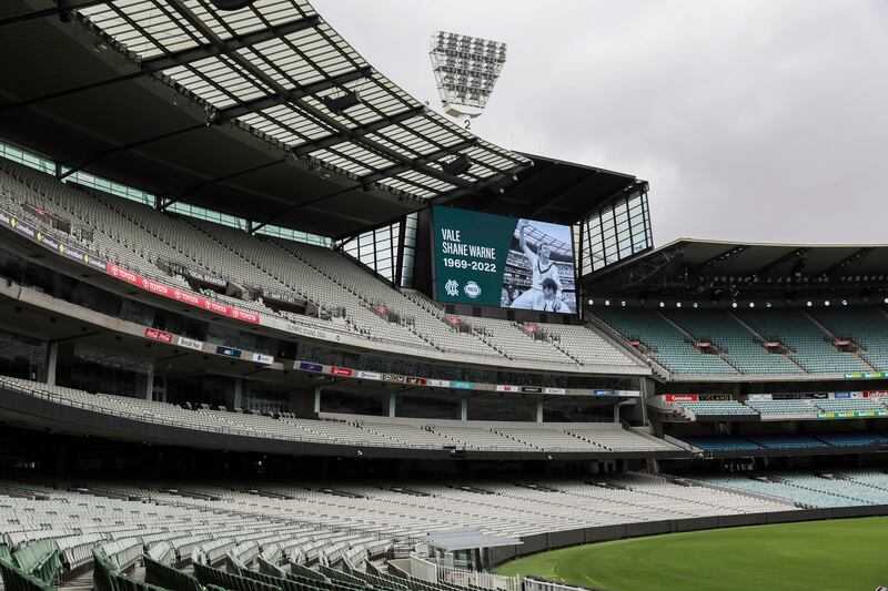 A tribute to cricket legend Shane Warne is displayed on the big screens at the Melbourne Cricket Ground. AP