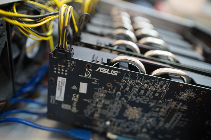 Graphics card devices sit in a mining rig during assembly before installing in a shipping container mobile mining farm, operated by BitCluster, in Rodniki Industrial Park in Rodniki, Russia, on Tuesday, Feb. 6, 2018. Cryptocurrencies have been pummeled by a wave of bad news, including the threat of more regulation from governments including the U.S., China, South Korea and India. Photographer: Andrey Rudakov/Bloomberg