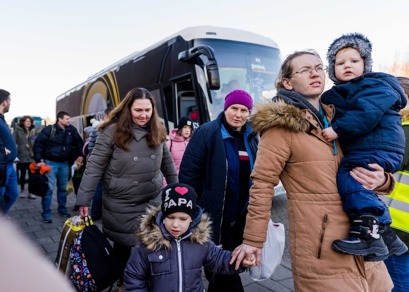 Ukrainian refugees arrive by bus at a sports hall in in Waddinxveen in the Netherlands. EPA
