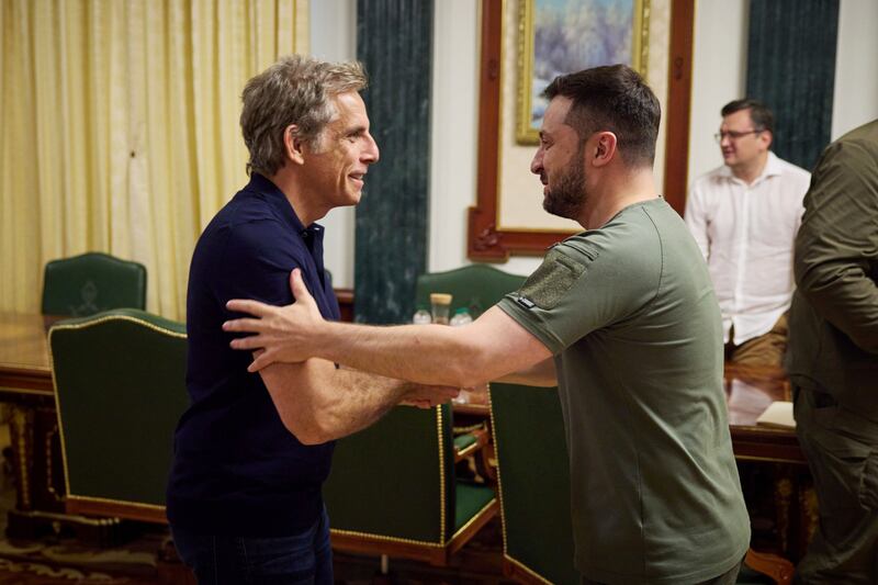 Zelenskyy, right, and UNHCR Goodwill Ambassador Ben Stiller shake hands during their meeting in Kyiv on June 20, 2022. Ukrainian Presidential Press Office via AP