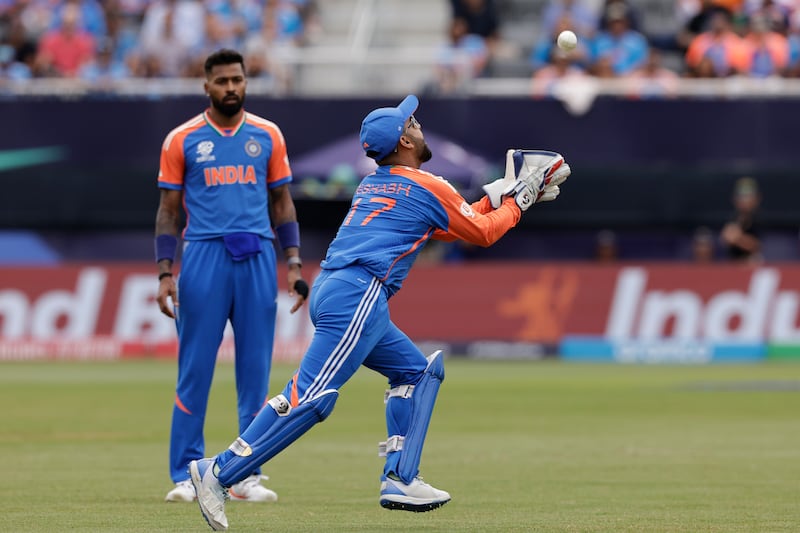 India wicket-keeper Rishabh Pant takes a catch to dismiss United States' Corey Anderson for 15.