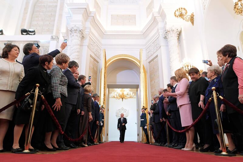 Vladimir Putin enters to take the oath during his inauguration ceremony at the Kremlin Palace in Moscow, Russia. Yevgeny Biyatov / AP Photo