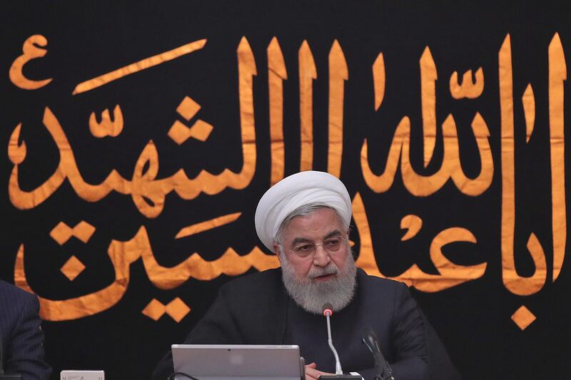 A handout picture provided by the Iranian presidency on September 11, 2019 shows President Hassan Rouhani chairing a cabinet meeting in the capital Tehran, with a banner behind him reading in Arabic "O martyr Abu al-Abbas al-Hussein", hung up during the Ashura mourning period and referring to the prophet Mohamed's grandson Imam Hussein ibn Ali.  - === RESTRICTED TO EDITORIAL USE - MANDATORY CREDIT "AFP PHOTO / HO / IRANIAN PRESIDENCY" - NO MARKETING NO ADVERTISING CAMPAIGNS - DISTRIBUTED AS A SERVICE TO CLIENTS ===
 / AFP / Iranian Presidency / HO / === RESTRICTED TO EDITORIAL USE - MANDATORY CREDIT "AFP PHOTO / HO / IRANIAN PRESIDENCY" - NO MARKETING NO ADVERTISING CAMPAIGNS - DISTRIBUTED AS A SERVICE TO CLIENTS ===
