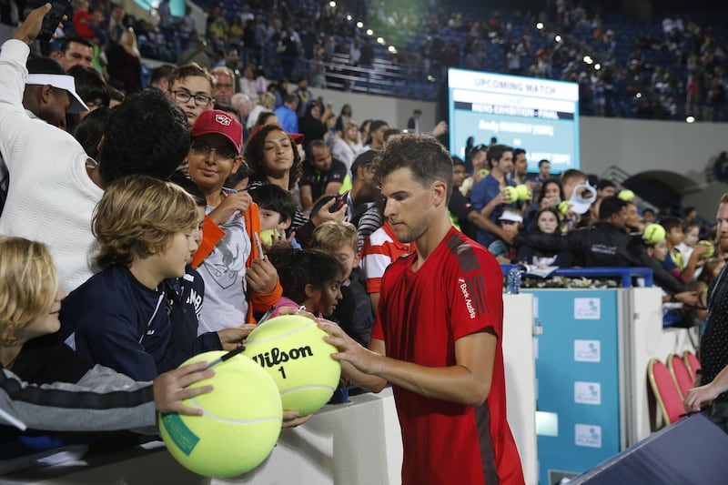 Dominic Thiem signs autographs for young fans at the 2017 Mubadala World Tennis Championship. The world No 7 will return to Abu Dhabi for the December 27-29 exhibition event. Courtesy Flash Entertainment