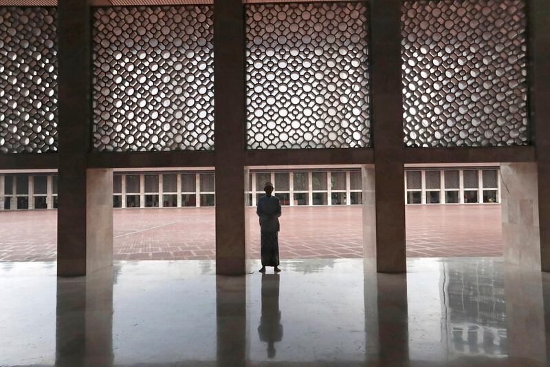 A Muslim man prays at Istiqlal Mosque in Jakarta, Indonesia. AP Photo