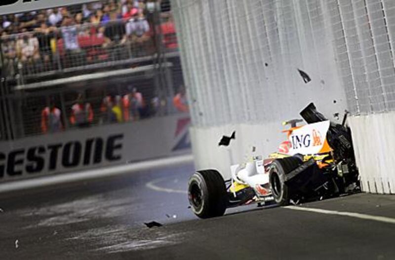 Nelson Piquet Jr crashes into a wall during the Singapore Grand Prix last year.