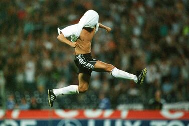 Germany's Mehmet Scholl celebrates scoring a goal by covering his head with his shirt and jumping in the air Germany v Spain 4-1 International Friendly Match Hannover, Germany 16/08/2000 Photo: Michael Kolvenbach © Sporting Pictures (UK) Ltd Tel: 020 7405 4500 Fax: 020 7831 7991 www.sporting pictures.com Mandatory Credit: Action Images / Sporting Pictures *** Local Caption *** 91010055