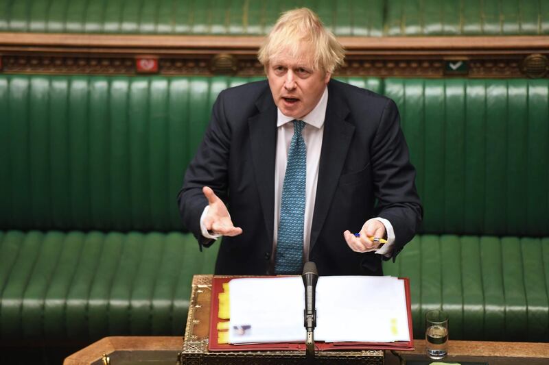 A handout photograph released by the UK Parliament shows Britain's Prime Minister Boris Johnson speaking during Prime Minister's Questions (PMQs) in the House of Commons in London on May 13, 2020.  Britain's economy shrank in the first quarter at the fastest pace since the 2008 financial crisis as the country went into lockdown over the coronavirus, official data showed Wednesday, leaving it on the brink of recession with a far worse contraction to come. - RESTRICTED TO EDITORIAL USE - NO USE FOR ENTERTAINMENT, SATIRICAL, ADVERTISING PURPOSES - MANDATORY CREDIT " AFP PHOTO / Jessica Taylor /UK Parliament"
 / AFP / UK PARLIAMENT / JESSICA TAYLOR / RESTRICTED TO EDITORIAL USE - NO USE FOR ENTERTAINMENT, SATIRICAL, ADVERTISING PURPOSES - MANDATORY CREDIT " AFP PHOTO / Jessica Taylor /UK Parliament"
