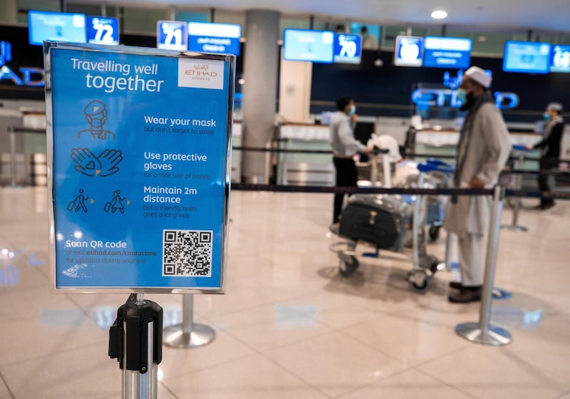 Abu Dhabi, United Arab Emirates, July 8, 2020.   
Abu Dhabi International Airport Media Tour by Etihad.  Passengers at the Etihad Check-In area.
Victor Besa  / The National
Section:  NA 
Reporter: