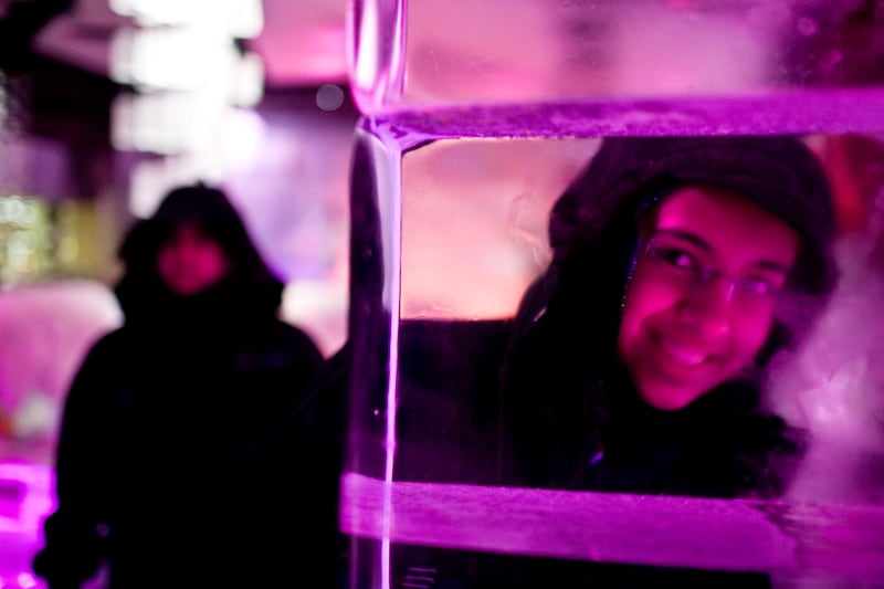 Dubai - August 17, 2008: Fatima Al Banwan, 16, from Kuwait, plays behind an ice wall at the Chillout ice lounge at Times Square Center. ( Philip Cheung / The National ) *** Local Caption ***  PC0033-chilloutlounge.jpgPC0033-chilloutlounge.jpg