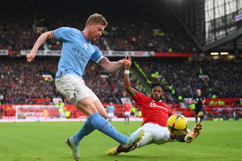 City's Kevin De Bruyne passes while under pressure from Fred. Getty