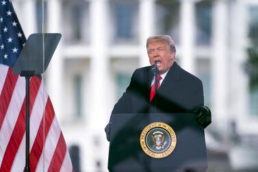 FILE - President Donald Trump speaks during a rally protesting the electoral college certification of Joe Biden as President in Washington on Jan.  6, 2021.  Trump continues to stoke the baseless claim that the 2020 election was stolen, and even now advocates for the results in certain battleground states to be decertified even though the falsehood has been rejected by dozens of courts and his own attorney general.  (AP Photo / Evan Vucci, File)