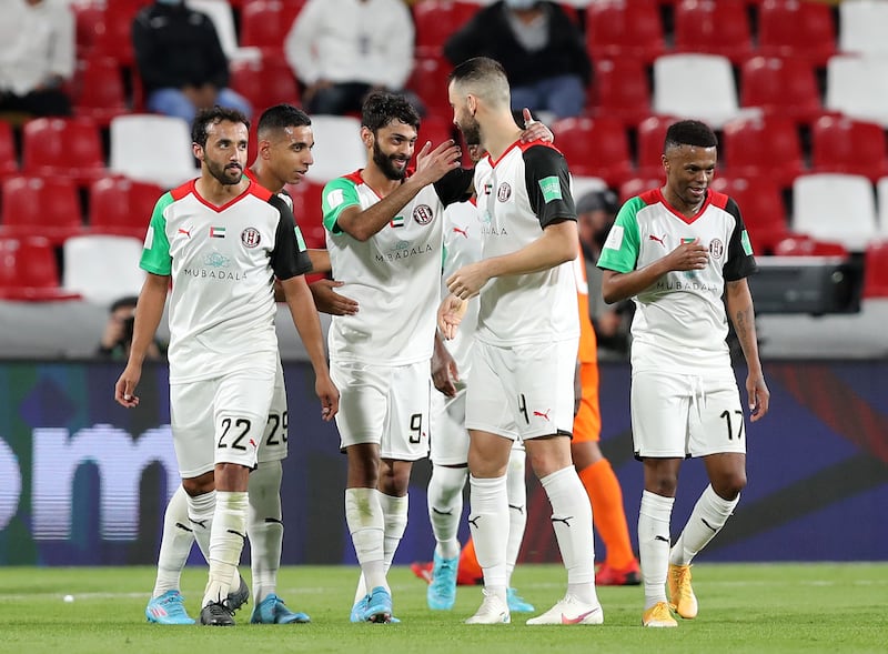 Milos Kosanovic celebrates scoring Al Jazira's third goal against Pirae in the Fifa Club World Cup at the Mohammed bin Zayed Stadium in Abu Dhabi. Chris Whiteoak / The National