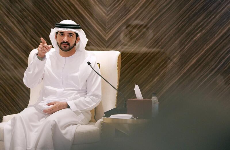 Sheikh Hamdan bin Mohammed hands over the Dubai Electricity and Water Authority the banner of the Hamdan bin Mohammed Program for Government Services 2020. WAM                                   