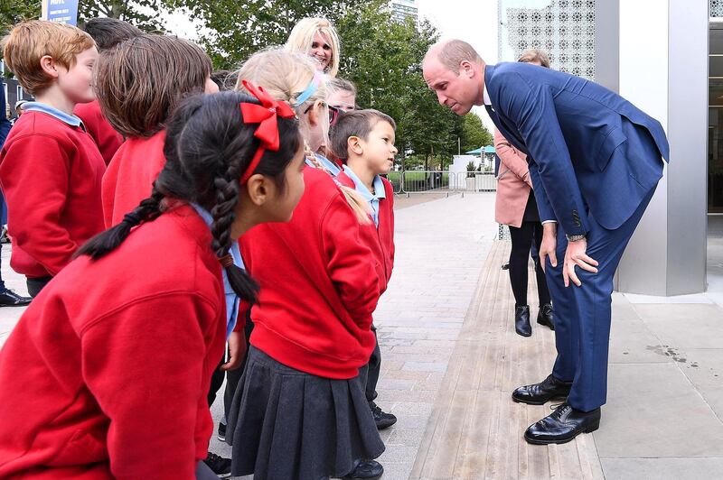 The couple met local school-children during the visit to the Aga Khan Centre. AFP