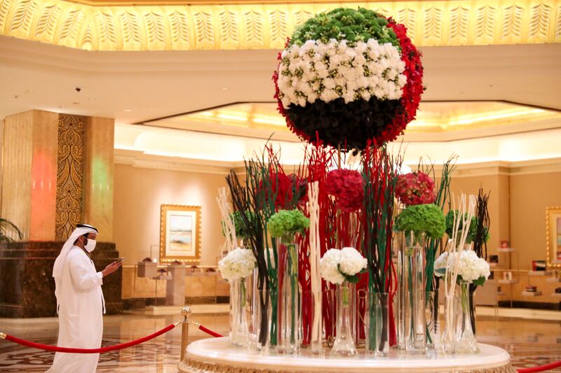 The central floral display at Emirates Palace hotel in Abu Dhabi to mark National Day. Khushnum Bhandari / The National