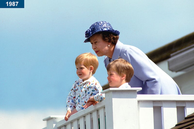 1987: The queen with Prince William and Prince Harry in the Royal Box at Guards Polo Club, Smiths Lawn, Windsor.
