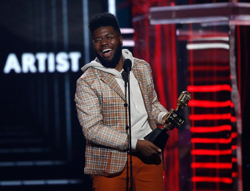 Khalid accepts the Top New Artist award. Reuters