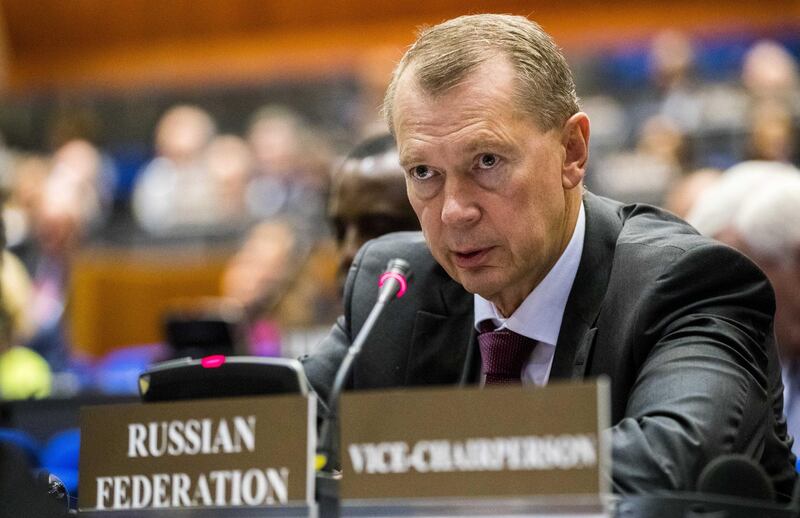 epa06840841 The Russian ambassador Alexander Sjoelgin during an extraordinary session of member states of the Organization for the Prohibition of Chemical Weapons (OPCW) initiated by the UK in The Hague, The Netherlands, on 26 June 2018.  EPA/JERRY LAMPEN