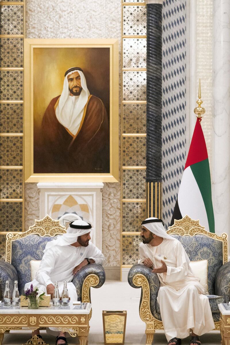 ABU DHABI, UNITED ARAB EMIRATES - May 20, 2018: HH Sheikh Mohamed bin Zayed Al Nahyan Crown Prince of Abu Dhabi Deputy Supreme Commander of the UAE Armed Forces (L), speaks with HH Sheikh Mohamed bin Rashid Al Maktoum, Vice-President, Prime Minister of the UAE, Ruler of Dubai and Minister of Defence (R), during an iftar reception at the Presidential Palace. 

( Hamad Al Kaabi / Crown Prince Court - Abu Dhabi )
---