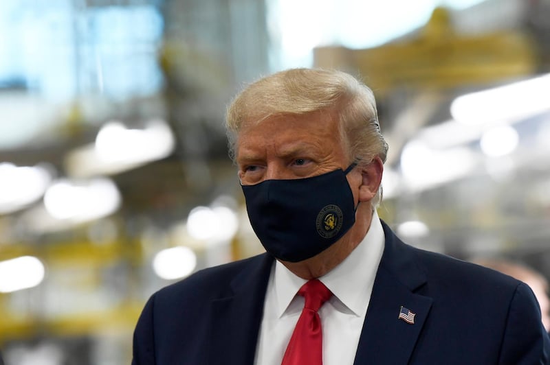 President Donald Trump wears a mask as he tours the Whirlpool Corporation facility in Clyde, Ohio, Thursday, Aug. 6, 2020.  (AP Photo/Susan Walsh)