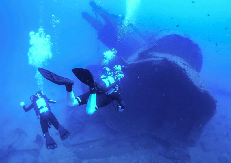 Divers swim near the shipwreck of Vichy France Second World War submarine Souffleur off the coast of the Lebanese town of Khaldeh, about 10 kilometres south of the capital Beirut. AFP