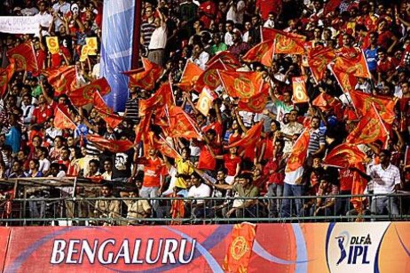 Royal Challengers Bangalore fans show their support during an IPL match against Mumbai Indians.