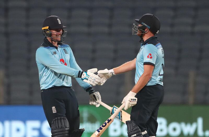 PUNE, INDIA - MARCH 26: England batsman Jason Roy (l) congratulates Jonathan Bairstow on his half century during the 2nd One Day International between India and England at MCA Stadium on March 26, 2021 in Pune, India. (Photo by Surjeet Yadav/Getty Images)