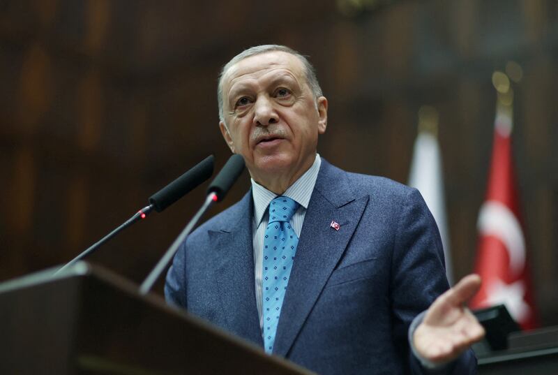 Turkish President Recep Tayyip Erdogan addresses MPs from his AKP Party during a meeting in parliament. Reuters